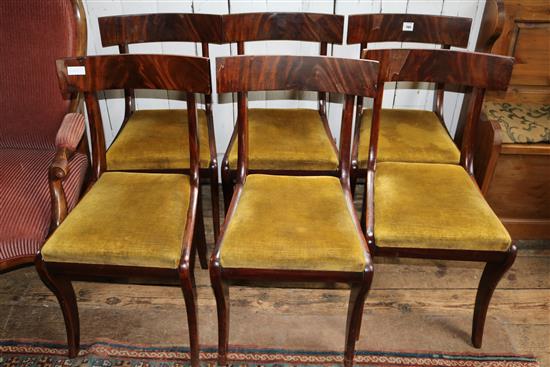 Six rectangular tablet back mahogany sabre leg dining chairs with drop in seats(-)